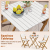 Folding patio bistro set featuring a spacious white tabletop and acacia wood chairs, perfect for outdoor relaxation.
