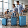 Three-piece blue hardside luggage set with 8-spinner wheels, showcasing different sizes for versatile travel needs.