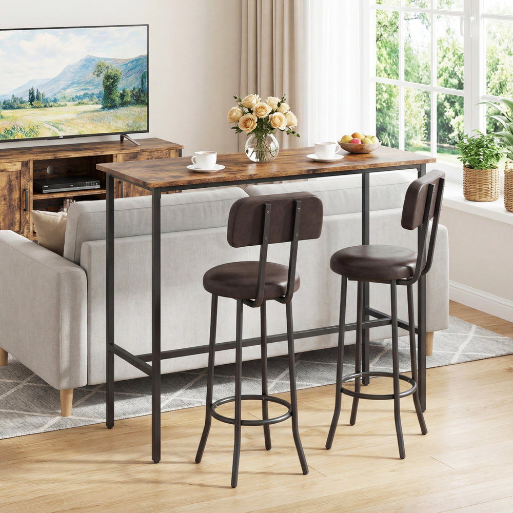 Industrial bar table with a rustic brown finish and two cushioned stools, ideal for compact dining areas.