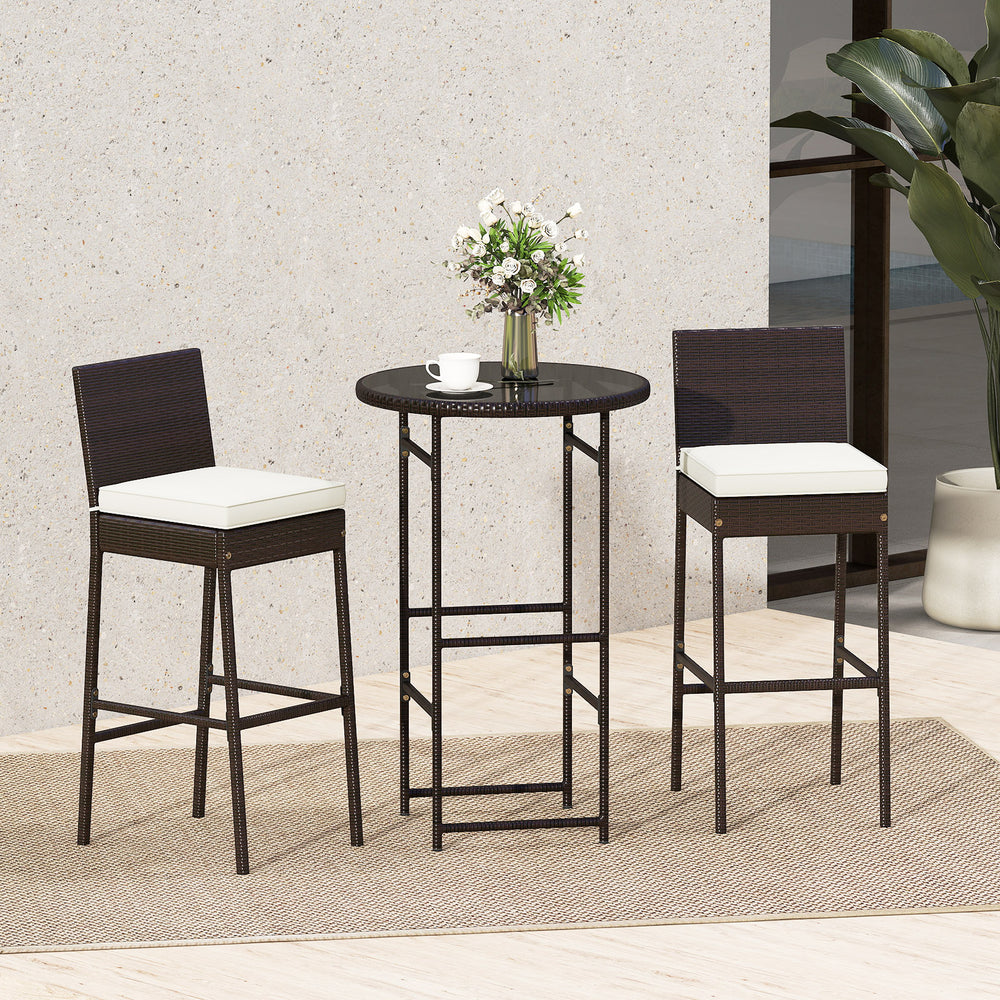 3-piece outdoor bar set featuring heavy-duty metal barstools with white cushions and a round tempered glass table for.