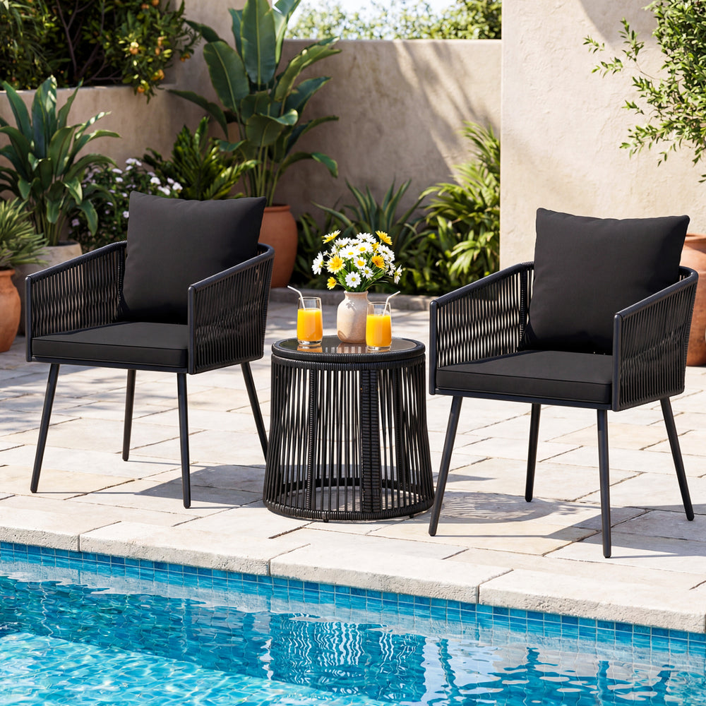 Black 3-piece outdoor furniture set with cushions, featuring a tempered glass tabletop, ideal for poolside relaxation.