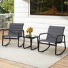 Two gray rocking chairs with a tempered glass table, perfect for outdoor patios and porches, featuring comfortable.