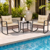 Two brown rocking chairs with thick cushions and a glass-top table create a relaxing outdoor conversation space.