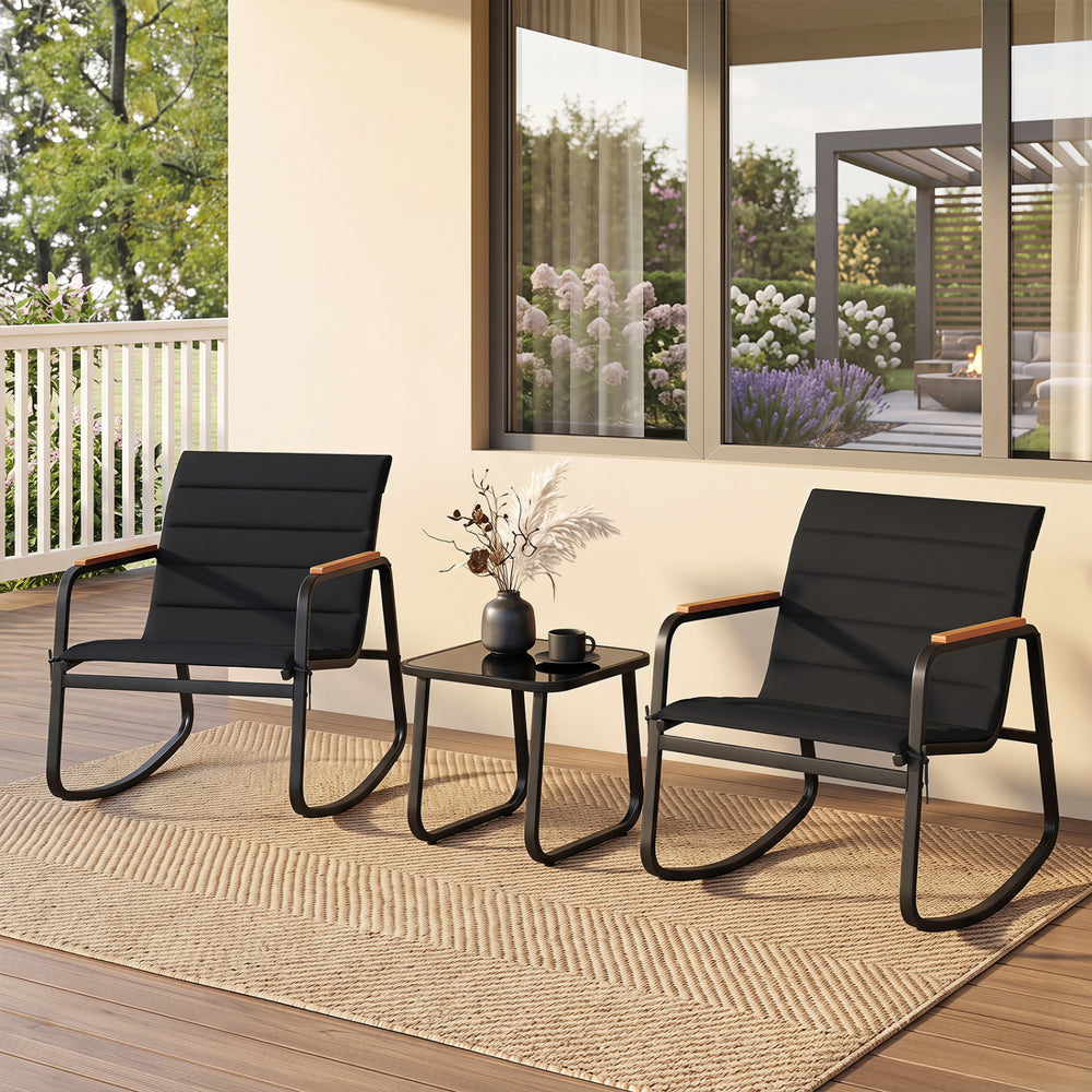 Two black rocking chairs with a tempered glass table, perfect for outdoor relaxation on your porch or patio.