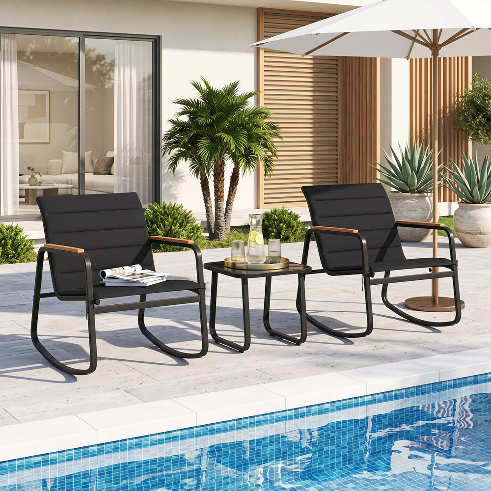 Two black rocking chairs with a tempered glass table, perfect for outdoor patios and poolside relaxation.