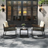 Two rocking chairs with cream cushions and a black coffee table, perfect for outdoor patio relaxation.