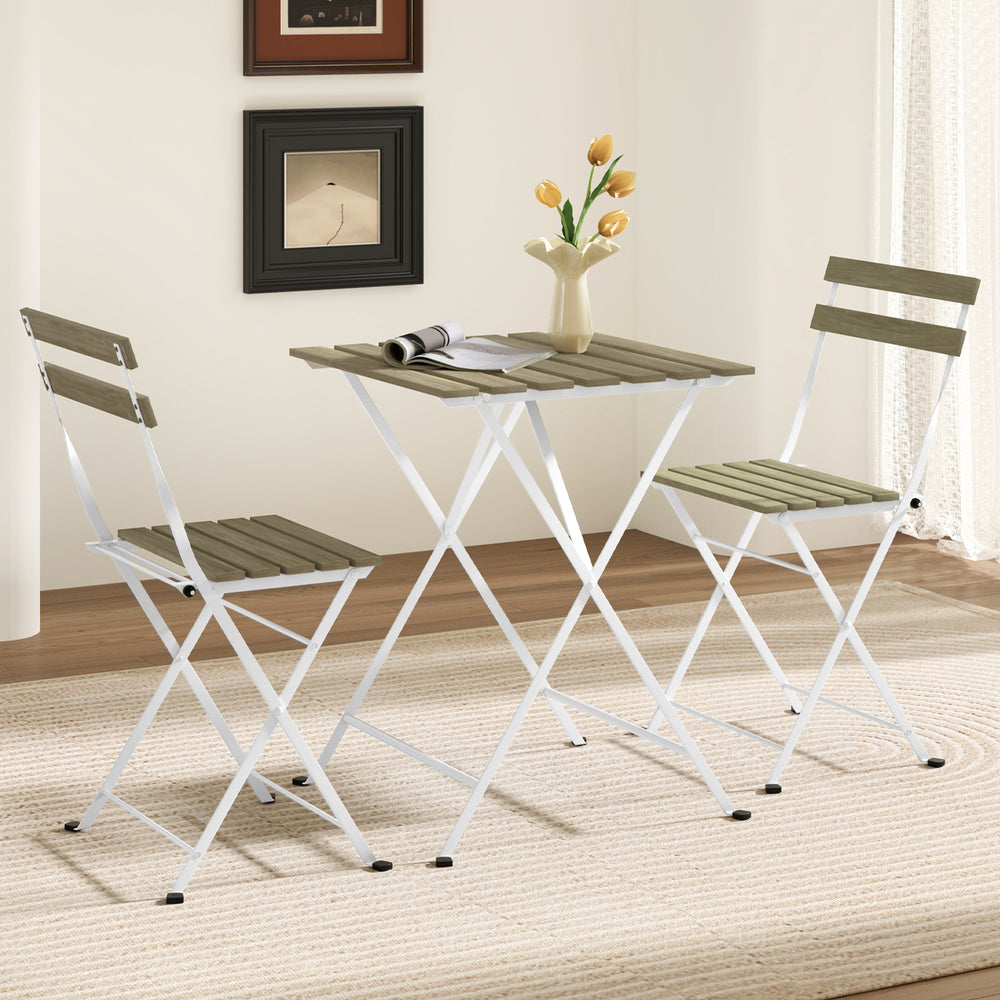 Gray 3-piece patio bistro set with acacia wood tabletop and slatted chairs, perfect for indoor or outdoor use.