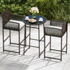 Bar height table and two ergonomic armchairs in brown PE wicker with white cushions, perfect for outdoor relaxation.
