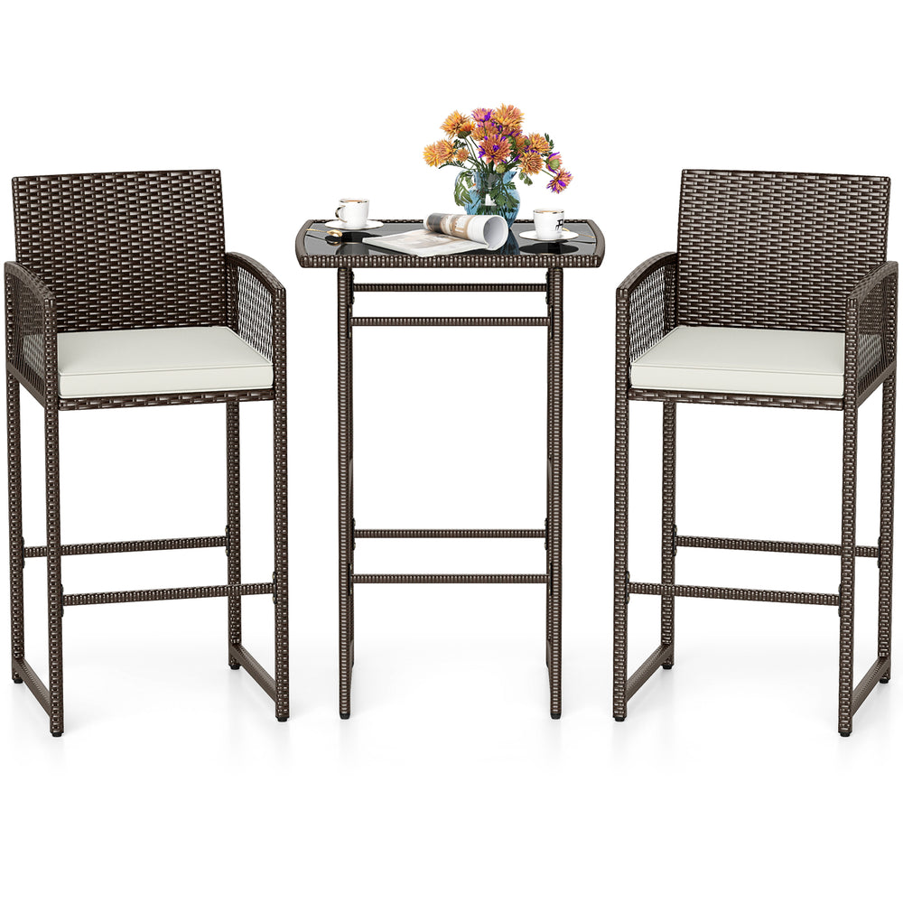 3-piece patio bar set featuring a wicker table and two ergonomic armchairs with white seat cushions for outdoor.