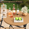 Folding round table from a 3-piece patio bistro set, featuring handwoven light brown PE rattan for outdoor use.