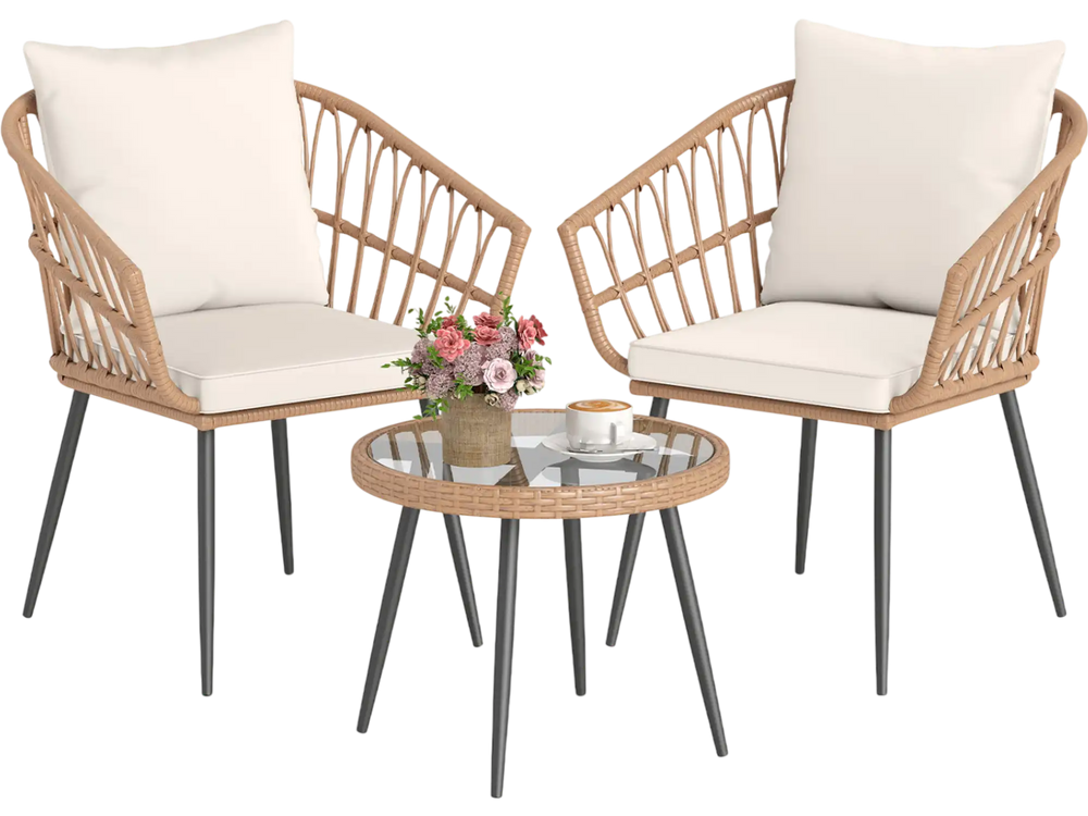 Two rattan wicker chairs with soft cushions and a tempered glass coffee table, perfect for outdoor patio use.