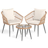 Two natural PE rattan wicker chairs with soft cushions and a tempered glass coffee table for outdoor patio use.