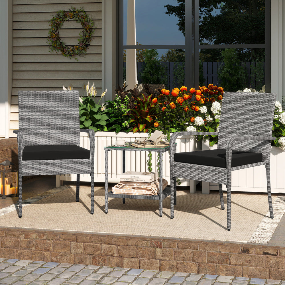 3-piece patio furniture set featuring PE rattan chairs with cushions and a tempered glass tabletop, ideal for balcony.