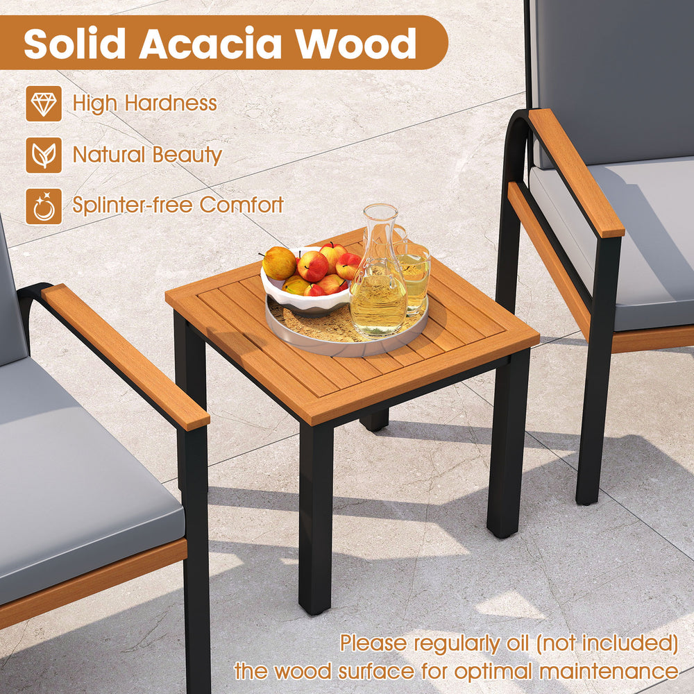 Solid acacia wood coffee table with slatted design, perfect for outdoor patio use, featuring a sturdy metal frame.