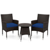 Two navy cushion chairs and a round table in a 3-piece patio furniture set made of brown PE rattan for outdoor.