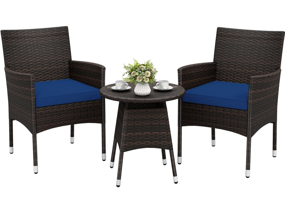 Two navy cushioned chairs with a round table, made of brown PE rattan, ideal for outdoor patio relaxation.