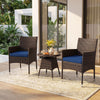 Two navy cushion patio chairs with a round table, crafted from brown PE rattan, perfect for outdoor relaxation.