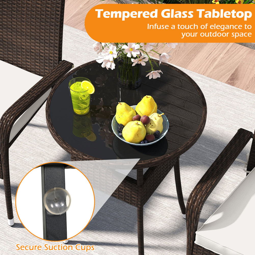 Round tempered glass tabletop with secure suction cups, part of a 3-piece patio furniture set with PE rattan wicker.
