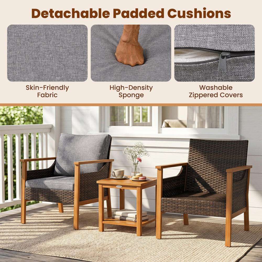 Two gray chairs with detachable padded cushions and a slatted side table, perfect for outdoor relaxation in your patio.