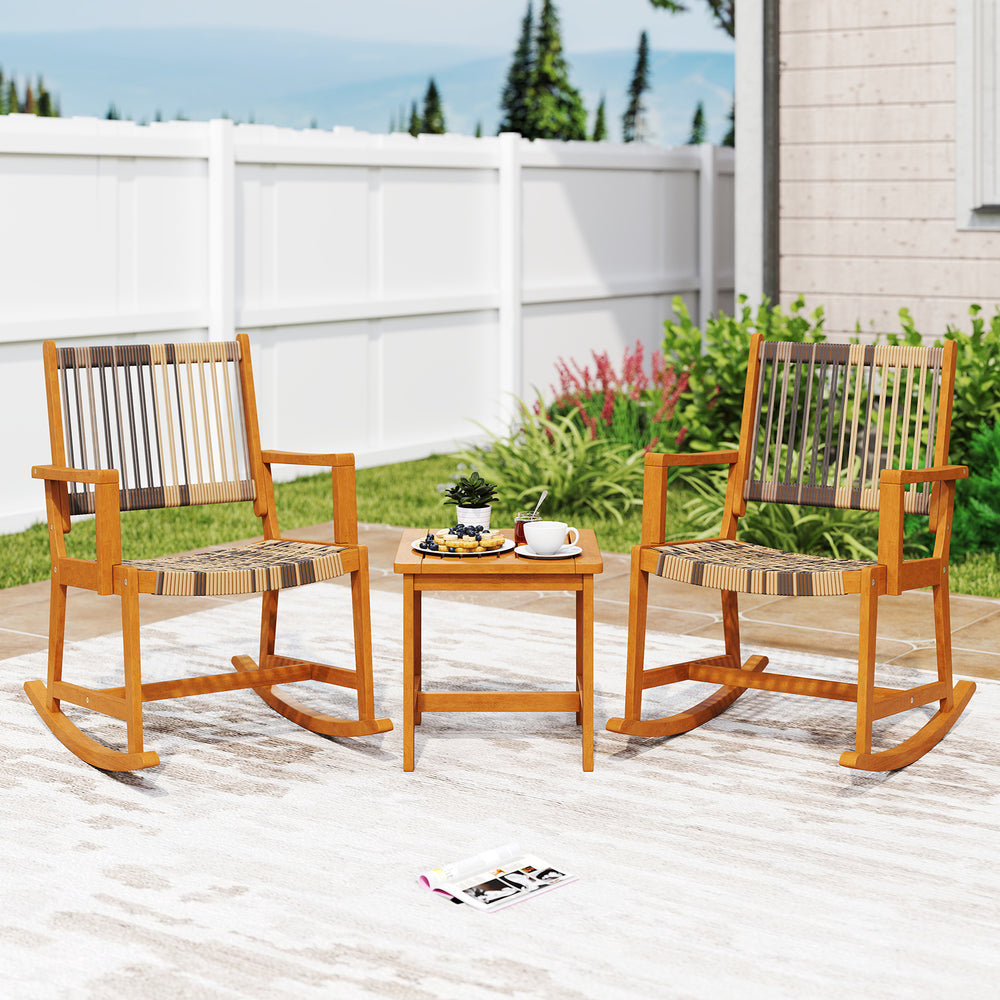 Stylish side view of acacia wood rocking chairs with breathable rattan seats, ideal for front porch lounging.
