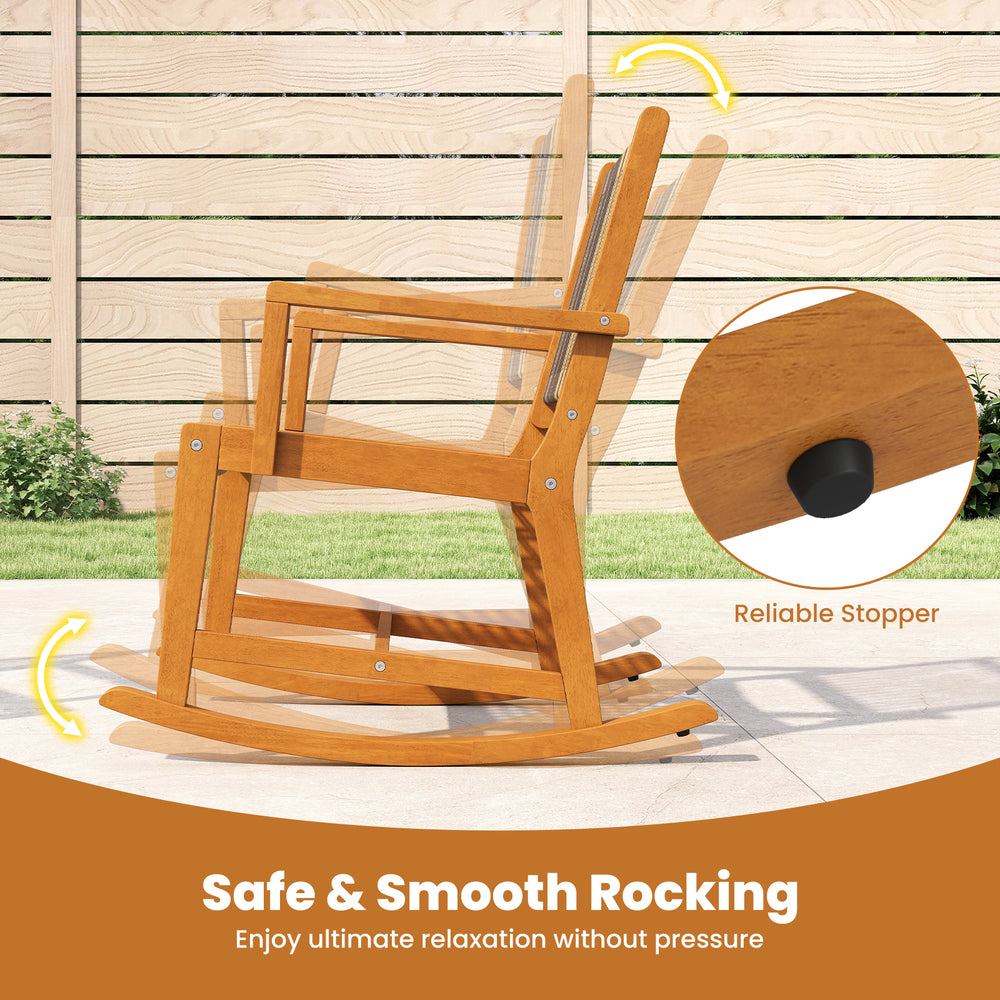 Acacia wood rocking chair with rattan seat, featuring a reliable stopper for safe and smooth rocking, ideal for outdoor.