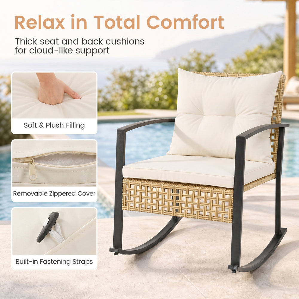 Rocking chair with thick white cushions and PE rattan design, perfect for relaxing on your patio or garden.