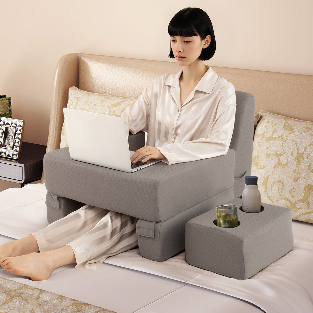 Extra large gray lap desk with contoured back pillow, ideal for reading, working, and gaming in comfort.