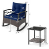 Navy blue rocking chair with PE rattan base and acacia wood table, perfect for outdoor relaxation on patio or balcony.