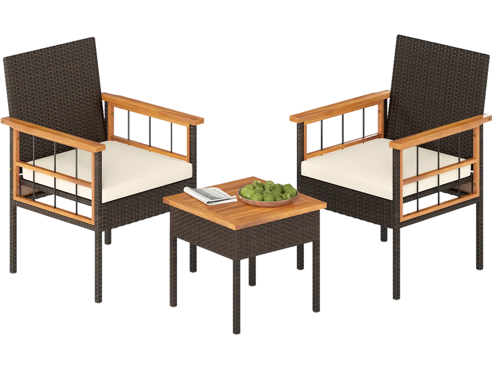 Two armchairs with soft cushions and a compact acacia wood tabletop, perfect for balcony relaxation.