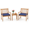 Two navy cushioned chairs and a matching coffee table made of acacia wood, perfect for outdoor relaxation.