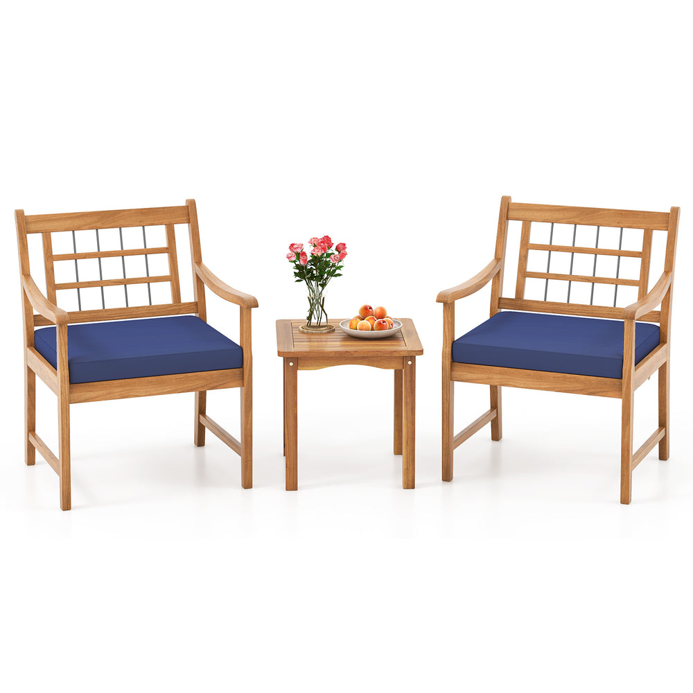 Two navy cushioned chairs and a matching coffee table made of acacia wood, perfect for outdoor relaxation.