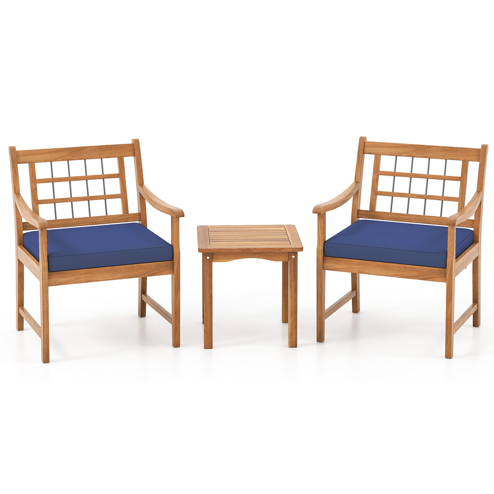 Two acacia wood patio chairs with navy seat cushions and a matching coffee table, perfect for outdoor relaxation.