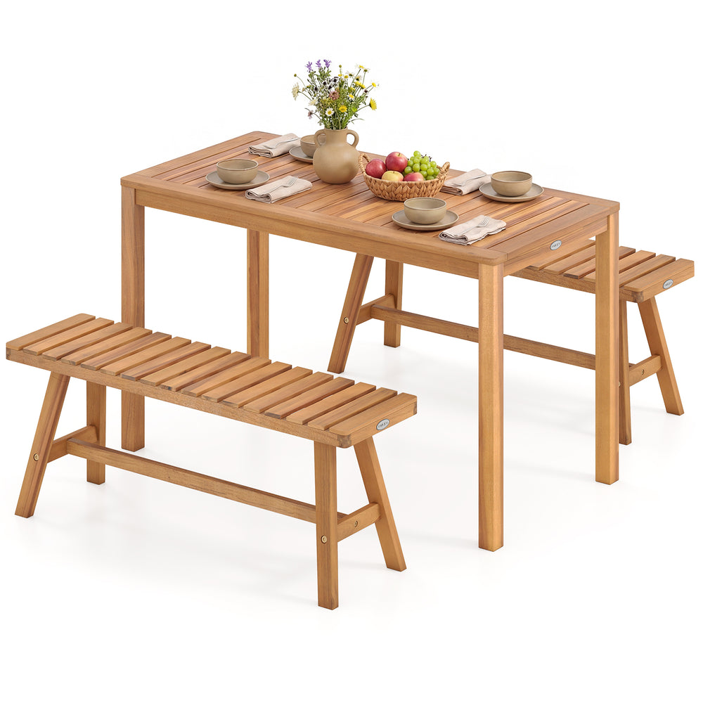 Acacia wood patio dining set featuring a rectangular table and slatted benches, ideal for outdoor gatherings.