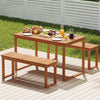 Acacia wood picnic set with two benches tucked under the table, ideal for space-saving outdoor dining in the garden.