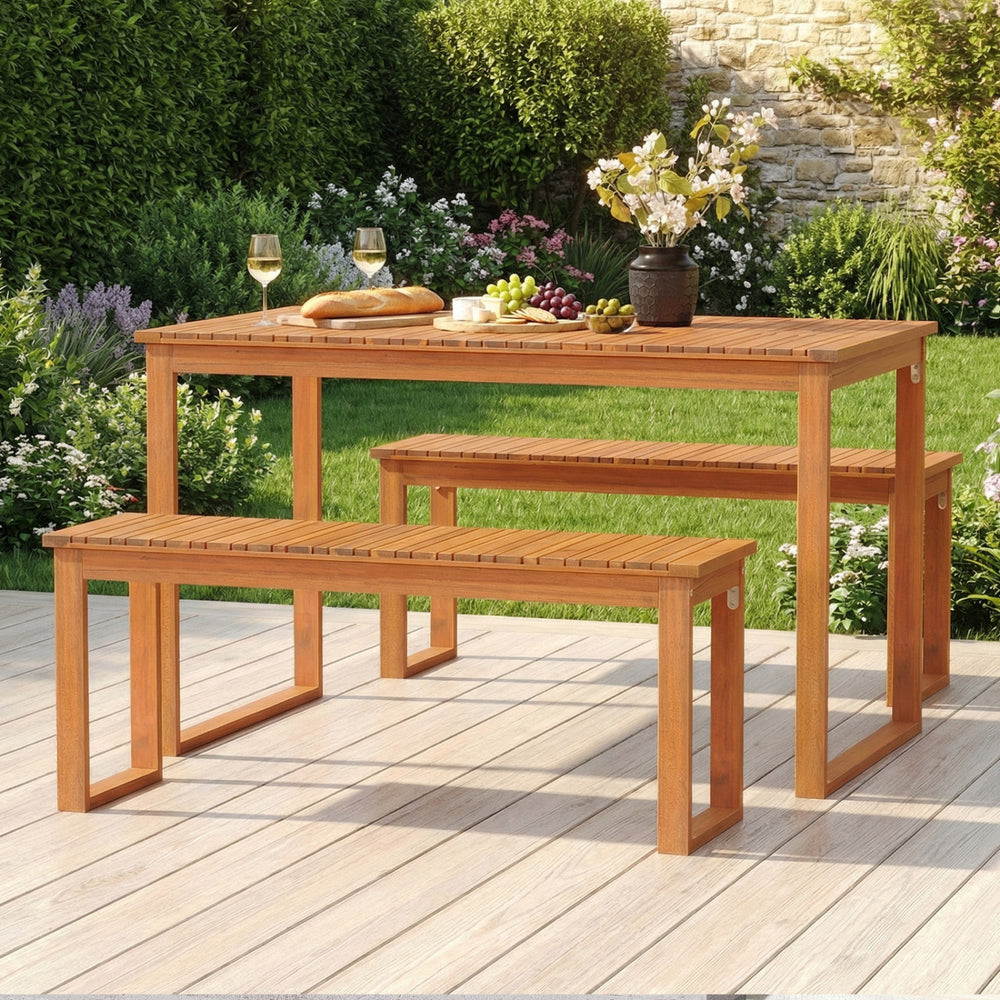 Acacia wood picnic set featuring a large dining table and two benches, perfect for outdoor gatherings in the garden.