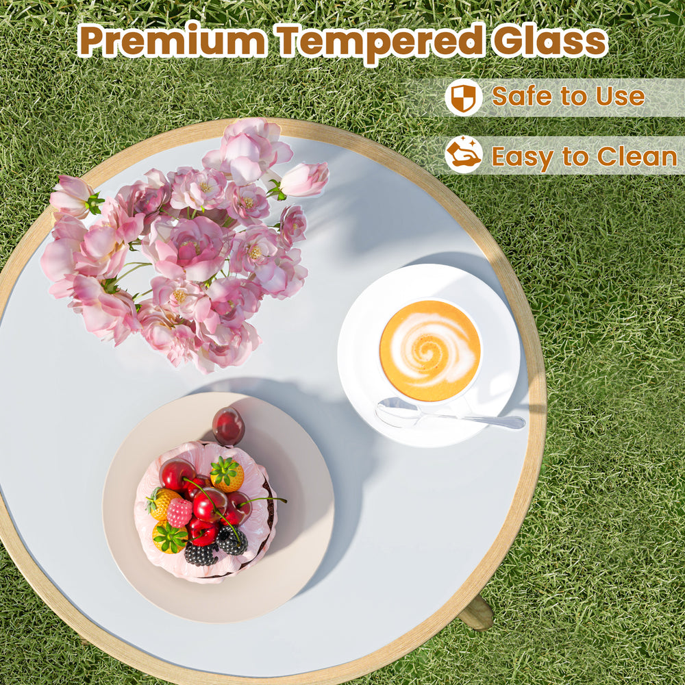 Round coffee table with premium tempered glass, featuring a soft cushion for comfort, perfect for outdoor bistro.