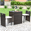 Cushioned wicker patio bistro set featuring a strong steel frame, ideal for outdoor relaxation on the patio or garden.