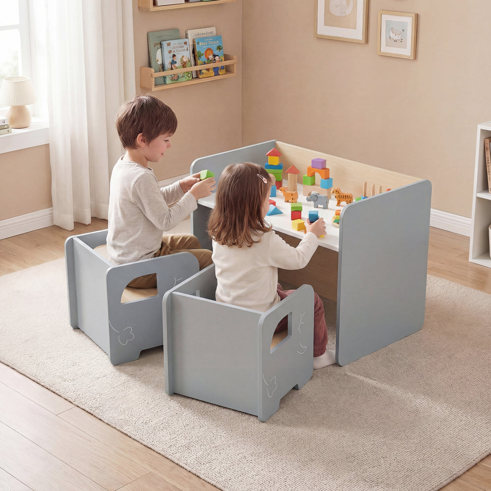 Kids playing at a gray 3-piece table and chair set, featuring a chalkboard surface and ergonomic design for comfort.