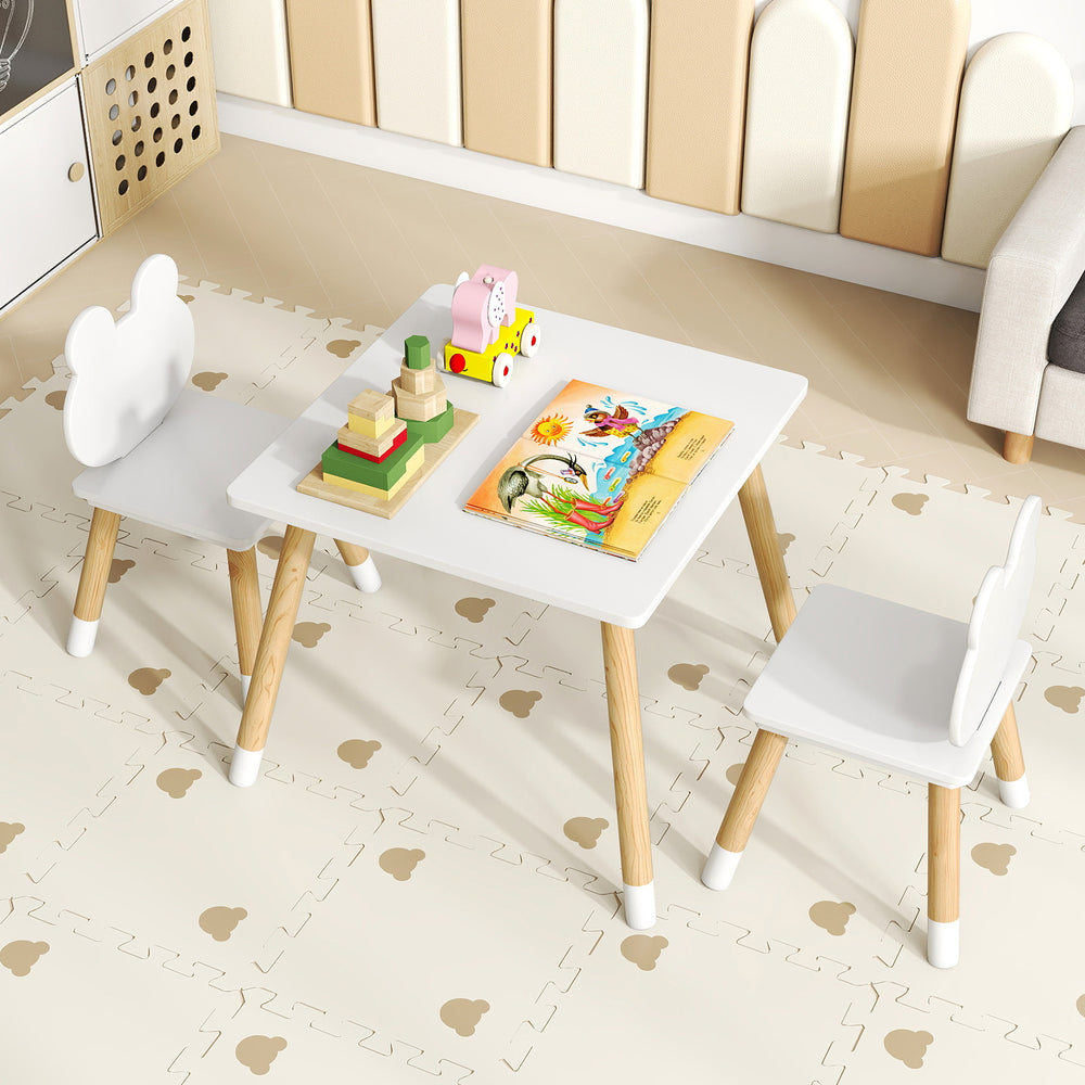 Kids white table with cute froggy design and natural pine legs, perfect for creative activities in playrooms or.