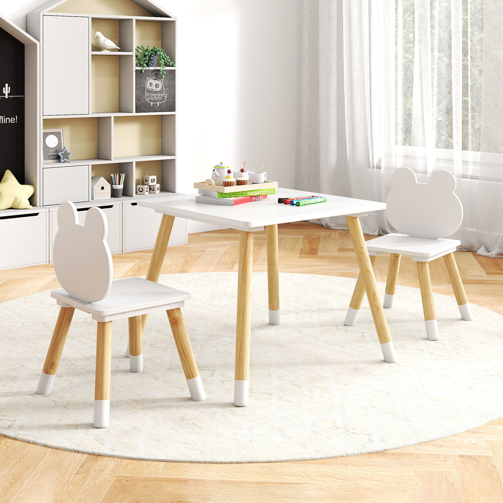 Kids wooden table and chair set with froggy design, natural pine legs, perfect for crafting and play in any room.