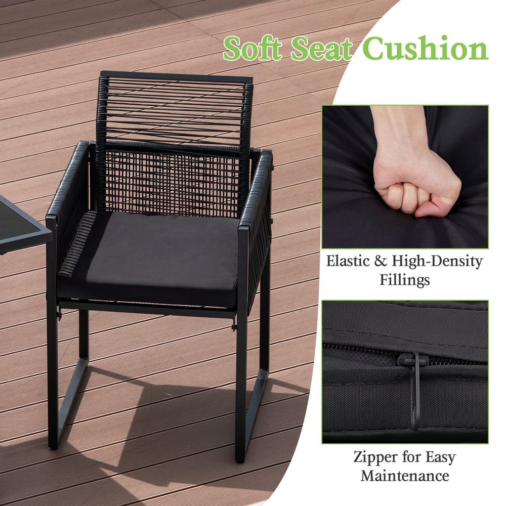Black outdoor dining chair with soft seat cushion, featuring a zipper for easy maintenance and a sturdy metal frame.