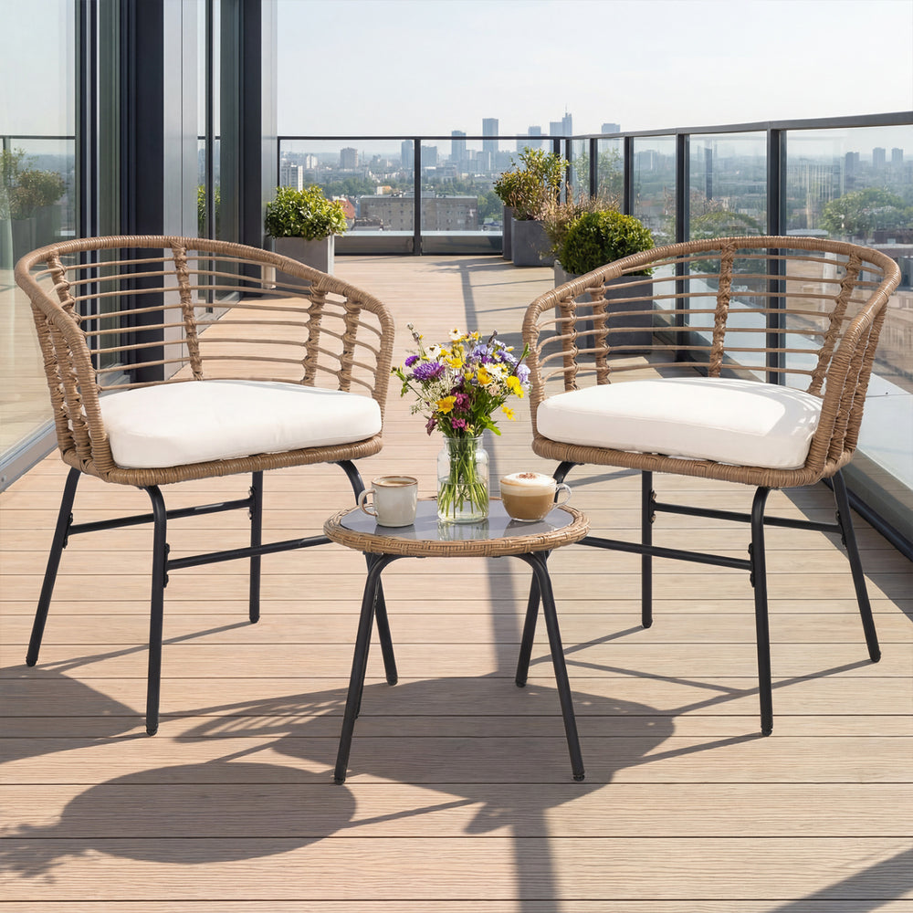 Close-up of the soft cushion on a hand-woven PE rattan chair, enhancing comfort for outdoor patio enjoyment.