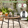 Round bistro table with tempered glass top and PE rattan, featuring suction cups for stability, perfect for outdoor.
