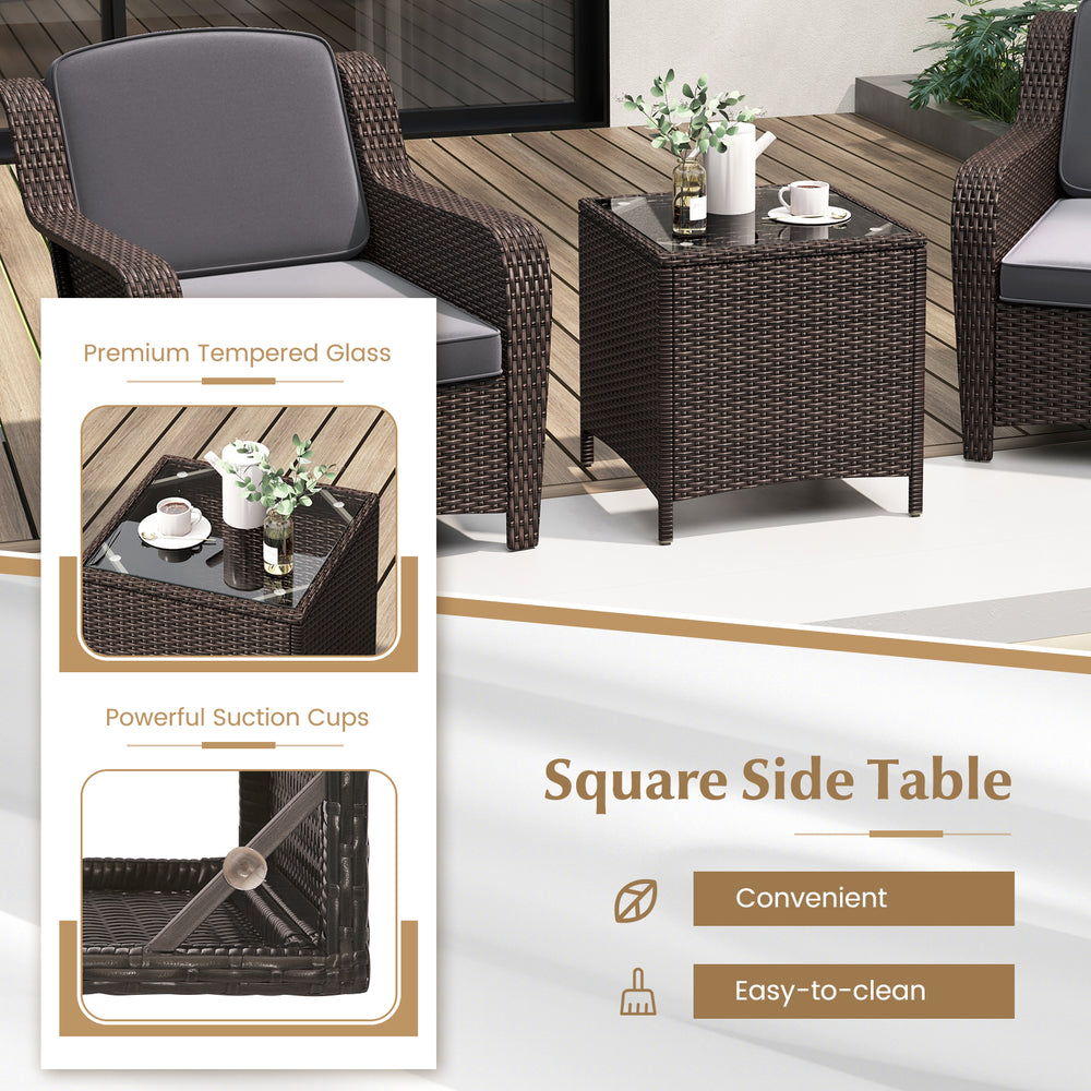 Square side table with premium tempered glass and suction cups, perfect for outdoor use with rattan furniture set.