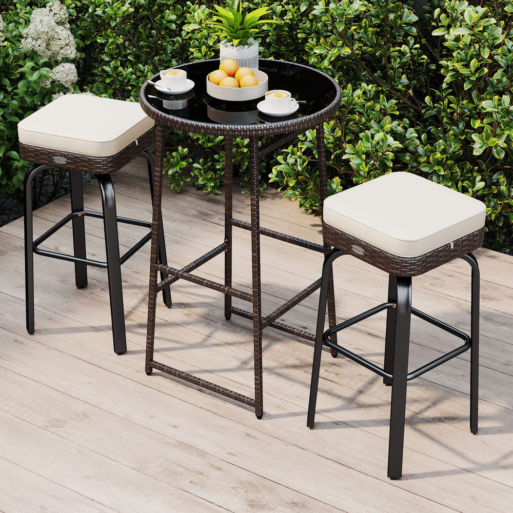 Bar height table with a tempered glass top and sturdy metal frame, ideal for outdoor dining on the patio or garden.