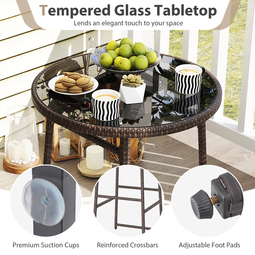 Tempered glass tabletop with premium suction cups on a PE rattan bar height table for outdoor patio use.