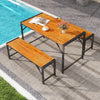Rectangular acacia wood dining table with two benches, perfect for outdoor patios and dining areas.