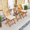 Acacia wood patio bistro set with beige cushions, featuring a folding design for easy storage and outdoor use.