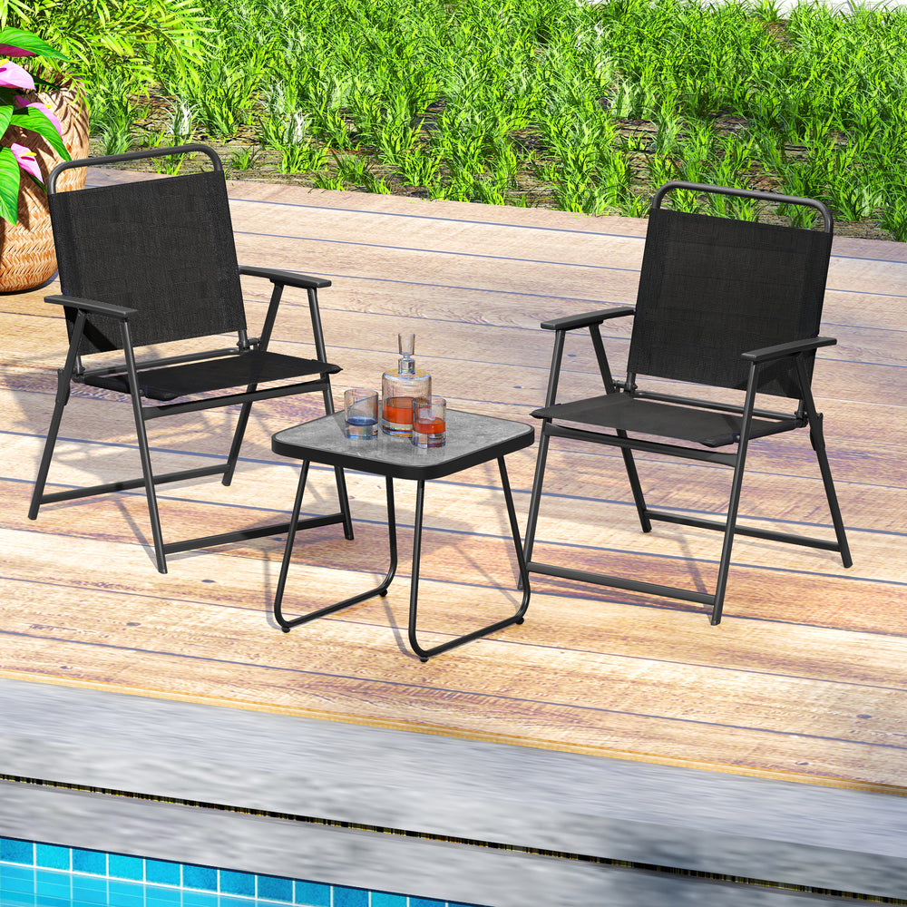 Black patio folding chairs and side table set, featuring breathable fabric, ideal for outdoor relaxation by the.