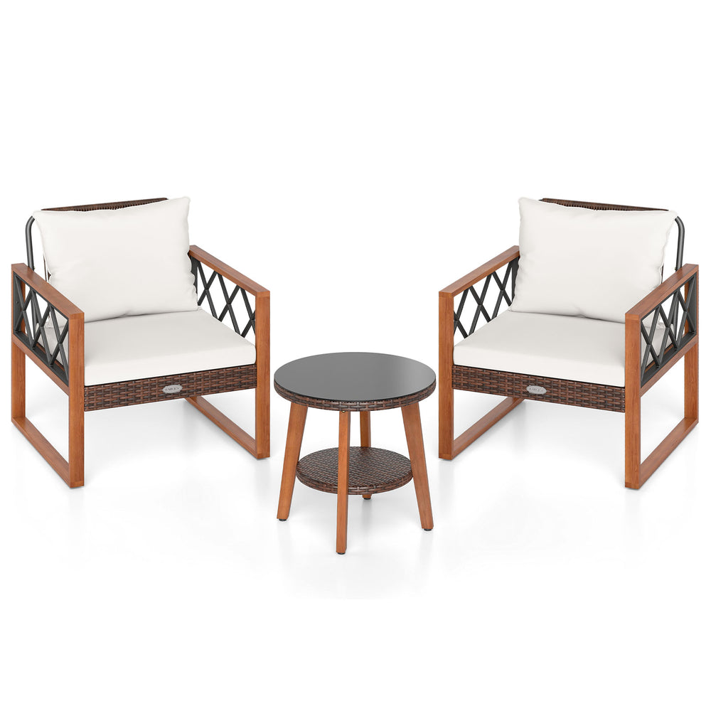 Two acacia wood chairs with off-white cushions and a tempered glass top table, perfect for outdoor patio relaxation.